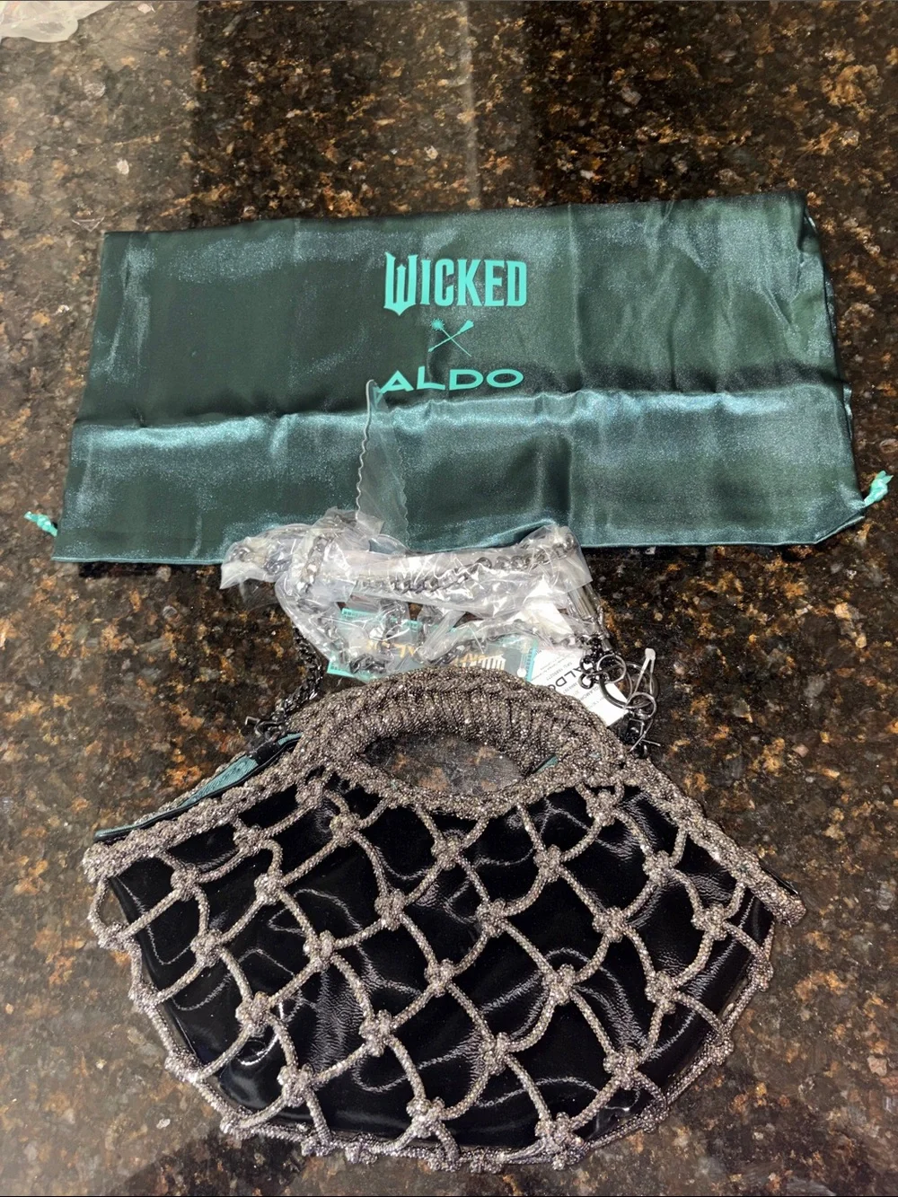 NWT wicked special edition Women’s Black Evening Clutch with Silver Beaded Net
